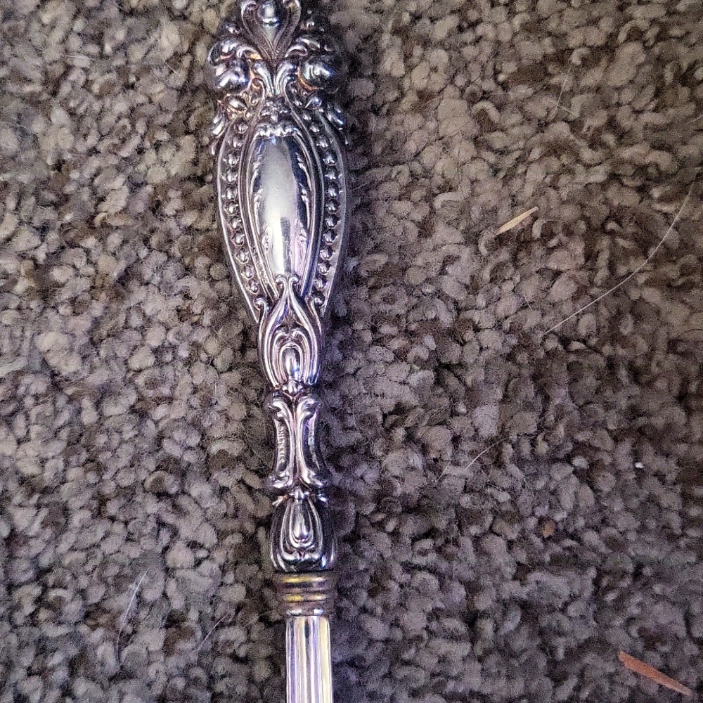 Vintage ornate serving fork and spoon electroplated with sterling handle 125.00